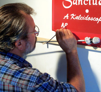 Business Sign Being Hand Painted